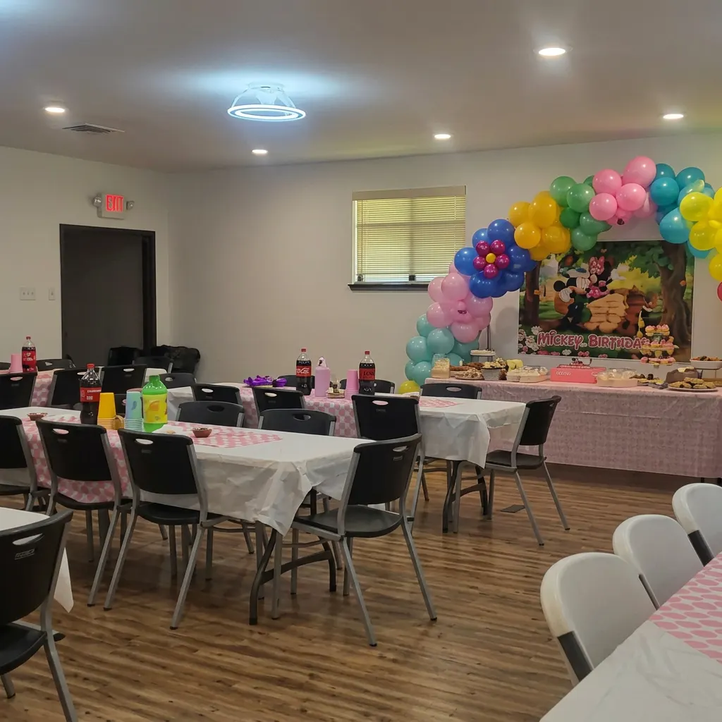 Venue set up with colorful balloon decor before a kids party.